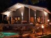 Garden chalet with atmospheric lighting at night